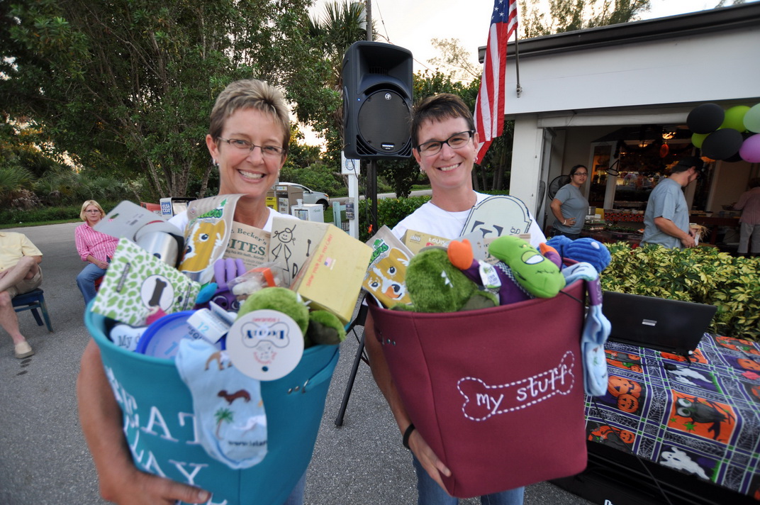 Ladies with donation baskets at Fundraising event