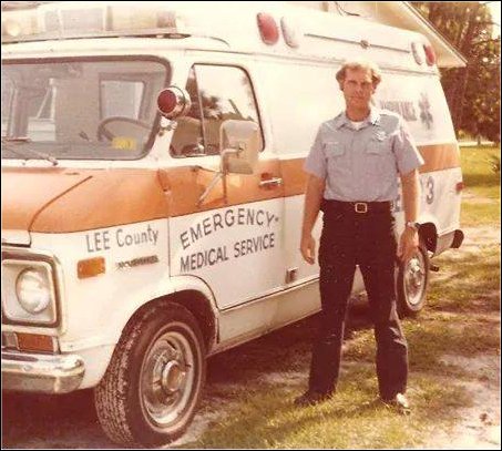 Lee County EMS Historical Picture of Paramedic standing by van style ambulance dating to the 1970s
